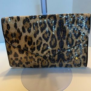 Stephanie Johnson sequined animal print clutch bag.